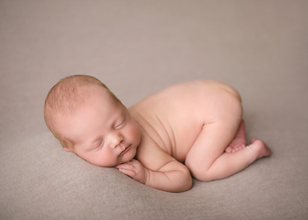 newborn baby posed for photoshoot